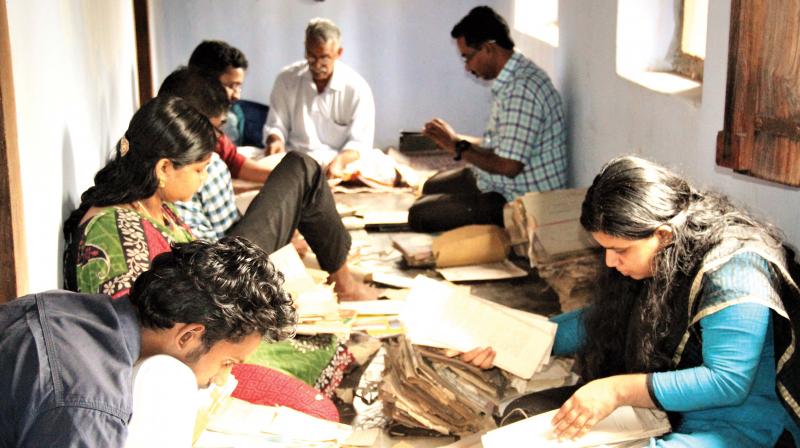 Researchers search through letters at the Kidangazhi Mana in Malappuram. (Photo:  DC)