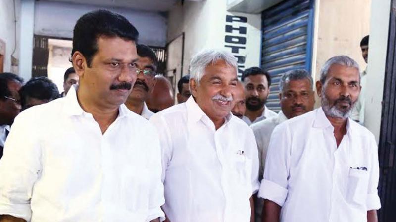Former chief minister Oommen Chandy along with Ludy Luiez MLA and former Kochi mayor Tony Chammany at the Solar Judicial Commission Office to give statement in the Solar case. (Photo: DC)