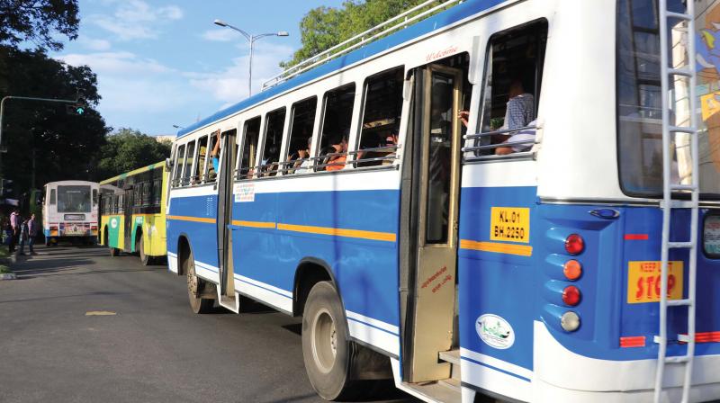 A bus plies with doors open in Thiruvananthapuram.