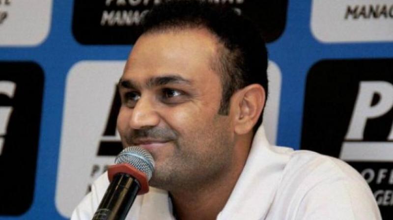 Virender Sehwag has become quite the Twitter celebrity. (Photo: AFP)