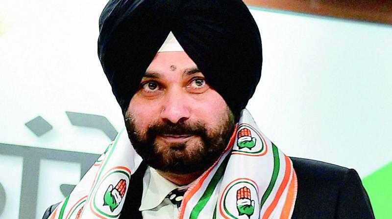 Navjot Singh Sidhu at a press conference a day after joining the Congress party, at AICC headquarters in New Delhi on Monday. (Photo: PTI)