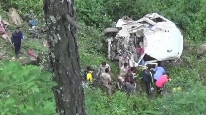 The vehicle fell into the gorge as the driver lost control over it following landslide which brought a heap of debris on the road. (Photo: ANI | Twitter)