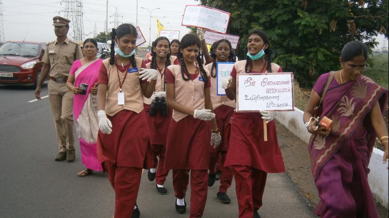 0NSS students of Wellington Government Higher Secondary School take part in awareness rally to protect Pallikarnai marshland. (Photo: DC)