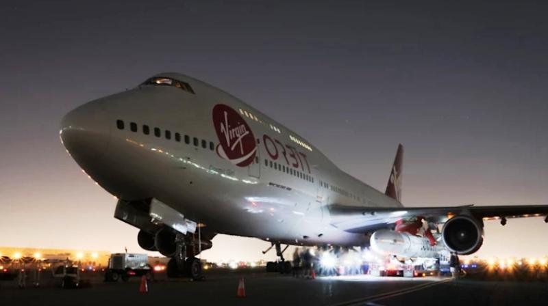 Virgin Atlantic has taken one of their commuter Boeing 747-400 aircraft, called the Cosmic Girl, and modified it heavily to make the rocket launch possible. (Photo: Virgin Orbit)