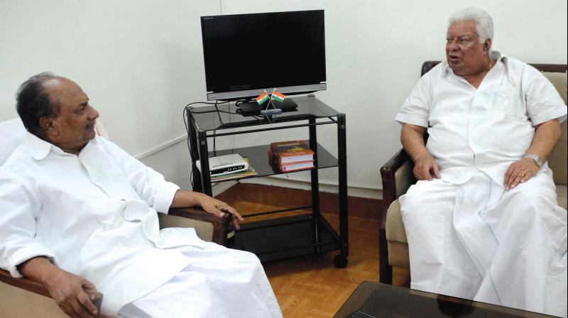 CWC member A.K. Antony chatting with UDF convenor P.P. Thankachan at KPCC office in Thiruvananthapuram on Tuesday. (Photo: DC)