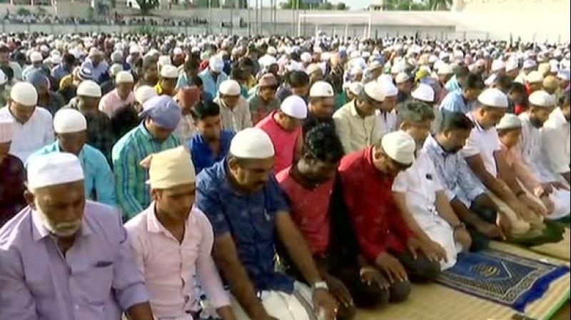 Hundreds of people offered prayers at Chandrasekharan Nair Stadium in Thiruvananthapuram on Friday to mark the end of the holy month. (Photo: ANI)