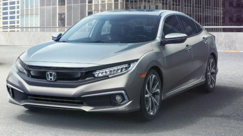 Honda has taken the wraps off of the mid-cycle refresh/facelift model of the tenth-gen Civic in the US.