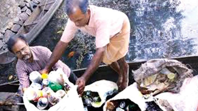 Plastic waste being collected from Vembanad lake.  (File pic)