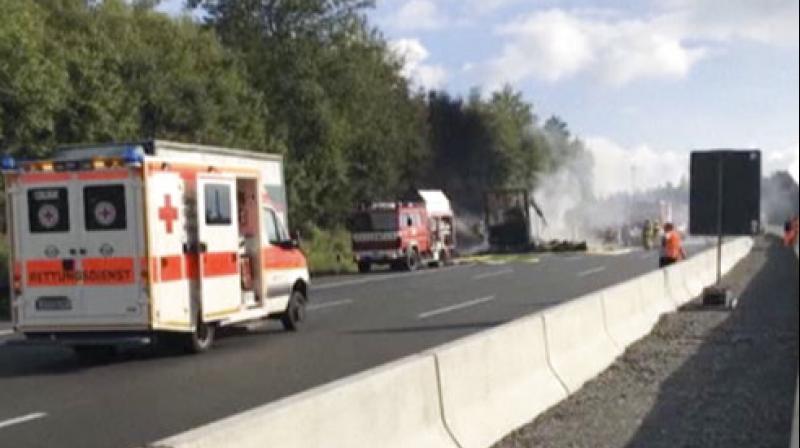 The bus carrying 46 passengers and two drivers rammed into the trailer in traffic jam on the motorway A9 close to the Bavarian town of Stammbach. (Photo: AP)