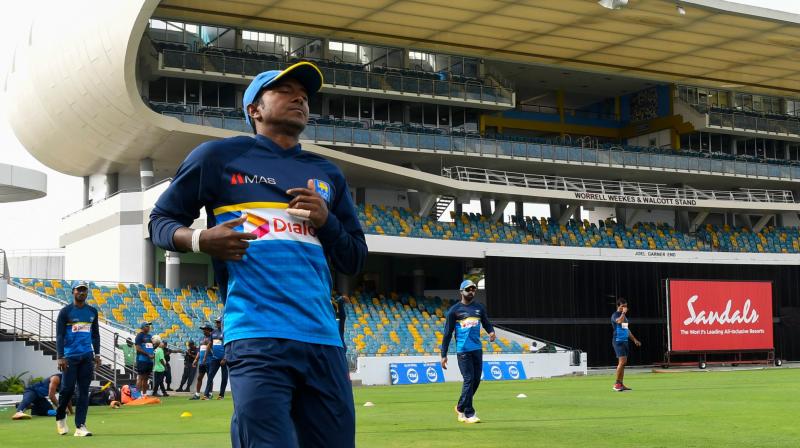The ICC, in a statement issued from its Dubai headquarters on Monday, said Dananjayas remodelled bowling action was assessed in Chennai on February 2, where it was found the amount of elbow extension for all his deliveries was within the allowed 15-degree level of tolerance. (Photo: AFP)