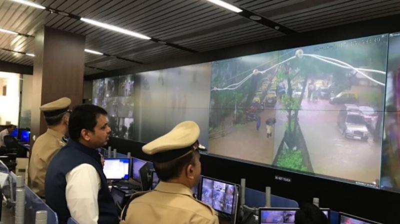 Maharashtra Chief Minister Devendra Fadnavis also visited the State Disaster Management Control room to oversee the present scenario. (Photo: @MumbaiPolice)