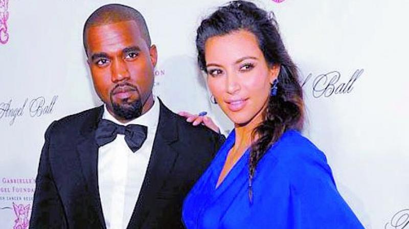 Kanye West and his wife Kim Kardashian
