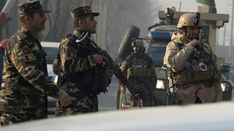 Security forces have swarmed the area, closing off the main road leading to the building. (photo: AFP)