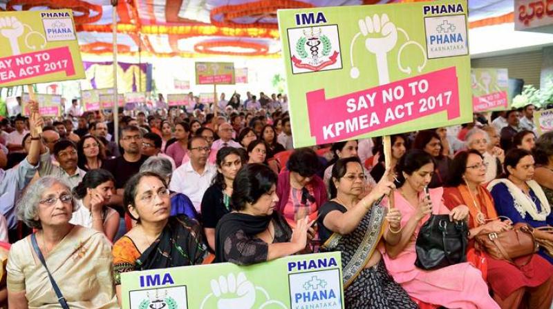 More than 22,000 doctors in Bengaluru alone, were protesting against the amendments to the Karnataka Private Medical Establishments Act, 2017 that prescribes fixed prices for the treatments and also holds them accountable in case of medical negligence. (Photo: PTI)