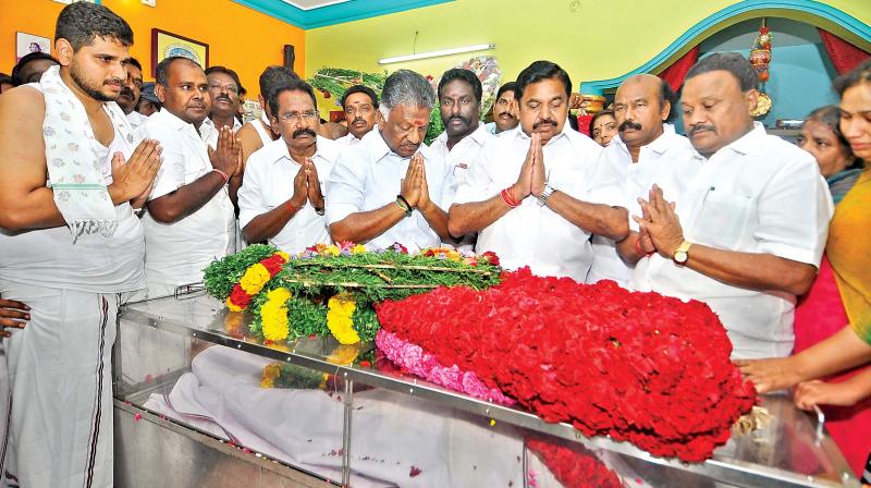 Chief Minister Edappadi K. Palaniswami and Deputy CM O. Panneerselvam pay homage to AIADMK legislator A.K. Bose who passed away in the wee hours of Thursday in Madurai. (Photo:DC)