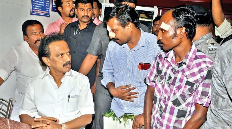 DMK working president M.K. Stalin condoles Salem RR Biriyani shop employees who were brutally attacked by his party men, on Thursday. 	(Photo:DC)