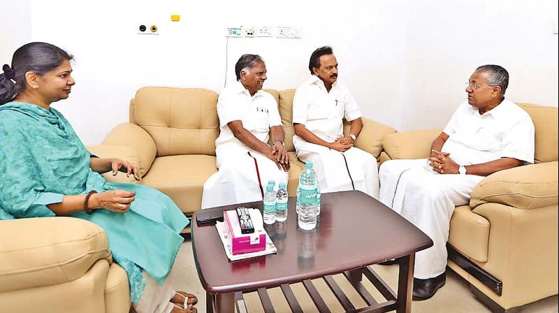 Kerala Chief Minister Pinarayi Vijayan calls on DMK working president M. K. Stalin and MP Kanimozhi at the Kauvery hospital where DMK president M. Karunanidhi is undergoing treatment and enquires about the DMK stalwarts health.	(Photo:DC)