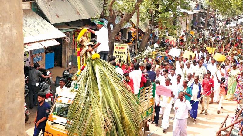 People of Pattukottai take out a procession, mourning the â€œdeath of Thennam pillaiâ€ (coconut trees) in the Gaja cyclone hit areas on Saturday.	 	DC