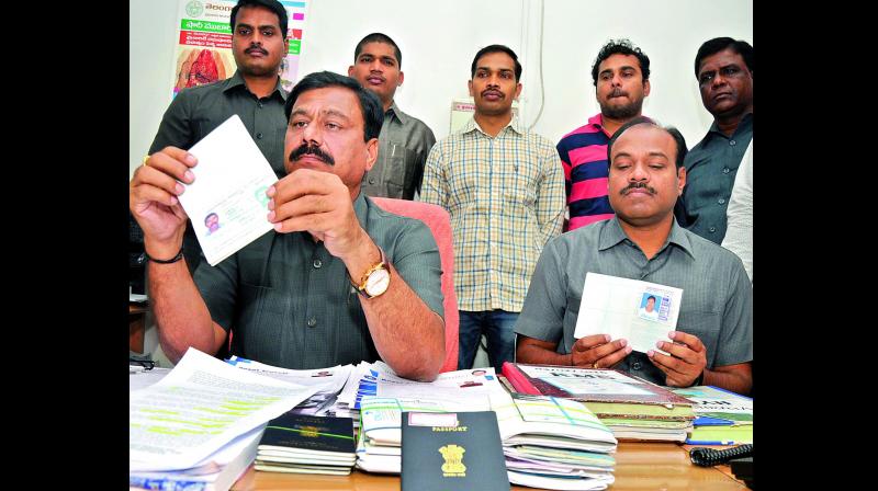 DCP Limba Reddy talks to the press on Friday after arresting five people involved in running fake employment agencies. (Photo: DC)