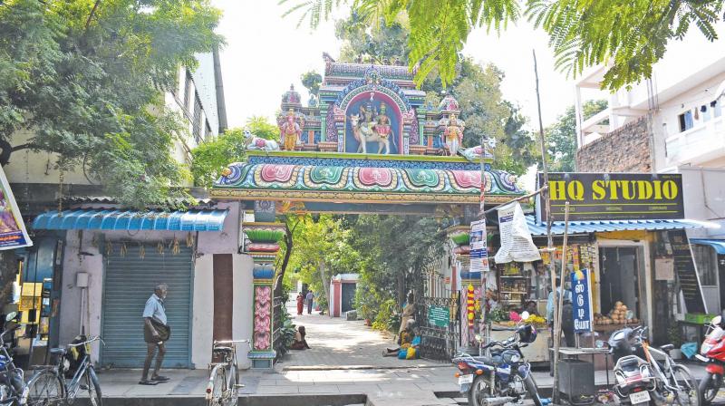 A faÃ§ade of the Agastheeswarar temple with buildings around. (Photo: DC)