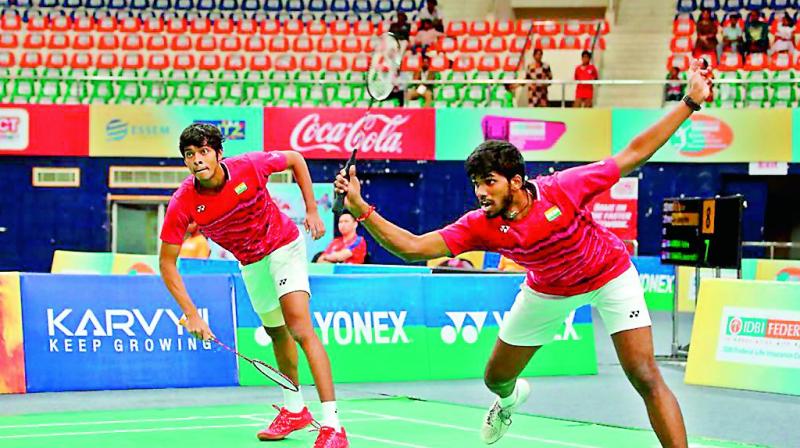 Satwiksairaj Rankireddy (right) and Chirag Shetty in action during their mens doubles semifinal in the ongoing BWF Tour Super 100 tournament on Saturday.