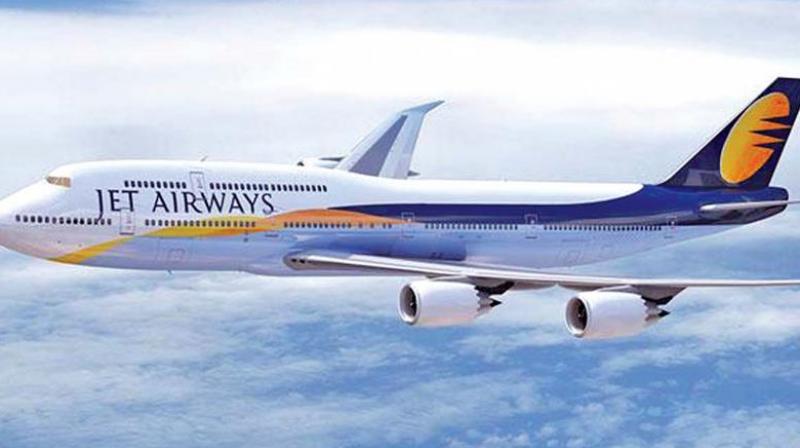 Jet Airways, Indias second-largest airline by market share, plans to slash pay of dozens of its junior pilots by as much as 50 per cent in a cost-cutting move, according to two sources and letters seen by Reuters.
