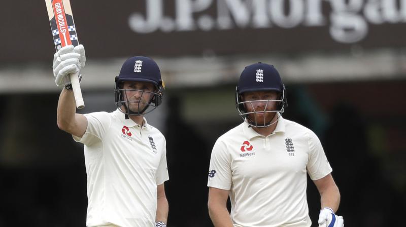 Jonny Bairstow and ton-up Chris Woakes derailed Indias plan to reduce Englands lead as the hosts tightened their grip on the second Test after leading India by 250 runs at stumps on Day three of the second Test at the Lords. (Photo: AP)