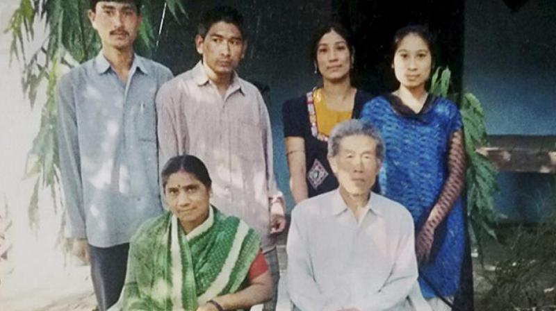 Wang Qi, 77, with his family in Bhopal. (Photo: PTI)