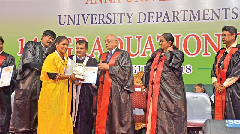 Dr R Chidambaram DAE-Homi Bhabha Professor, Bhabha Atomic Reaearch Center, Mumbai, gives away certificates to students during the graduation day of the College of Engineering Guindy, Madras Institute of Technology, on Wednesday. Vice-Chancellor of Anna University Professor M. K. Surappa is also seen. (Photo: DC)