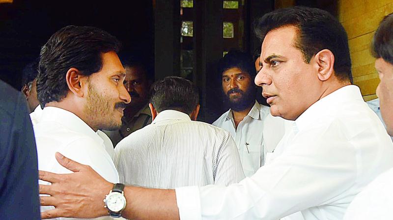 YSR Congress chief Y.S. Jagan Mohan Reddy and TRS working committee president K.T. Rama Rao at a meeting at the formers residence at Lotus Pond, in Hyderabad, on  Wednesday. (R. Pavan)