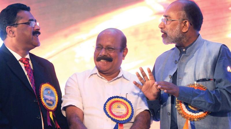 Union Minister of State for Tourism Alphons Kannanthanam with former VC of Sanskrit University Dr M. C. Dileep Kumar and Confederation of Kerala Sahodaya Complexes general secretary K. A. Francis after inaugurating the principals conference in Kochi on Friday. (Photo: ARUN CHANDRABOSE)