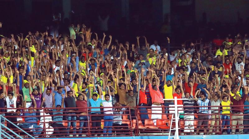 Fans at Jawaharlal Nehru International Stadium at Kaloor, Kochi on Saturday. (Photo: ARUN CHANDRABOSE)