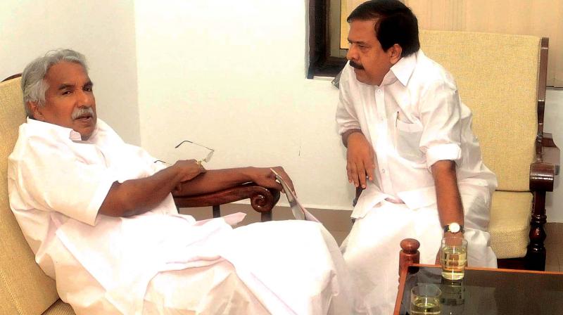 Former chief minister Oommen Chandy with leader of opposition Ramesh Chennithala (file pic).