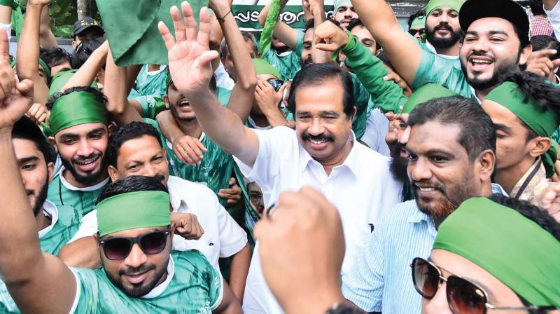 IUML workers cheer K.N.A. Khader after he was declared winner in the Vengara assembly bypolls on Sunday. (Photo: DC)