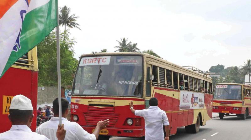 Congress activists block a KSRTC bus at Palayam underpass as part of the 12-hour hartal in Thiruvananthapuram on Monday. (Photo: A.V. MUZAFAR)