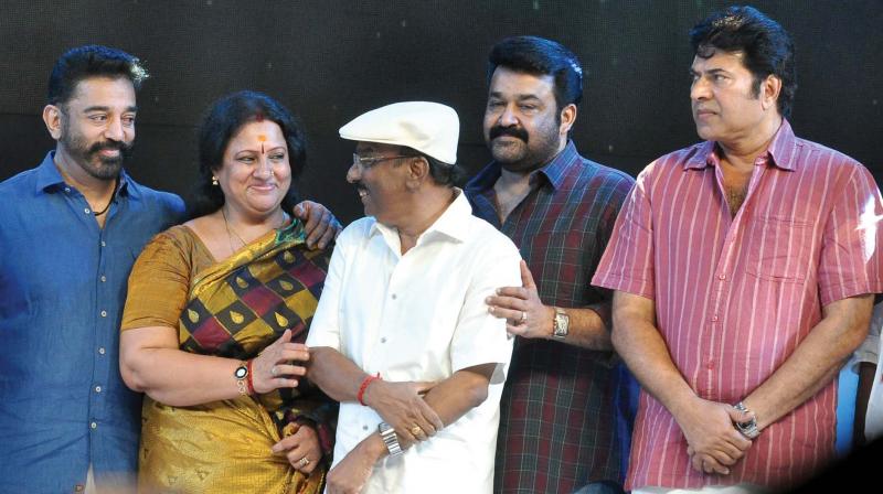 Sasi with Kamal Haasan, Seema, Mohanlal and Mammootty when the film fraternity came together to present the Lifetime Achievement Award to him in Kozhikode in 2013. (Photo:  DC)