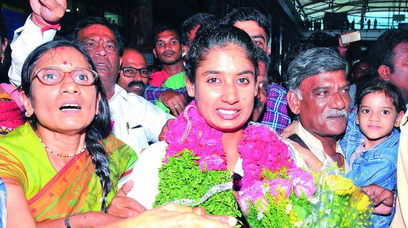 Mithali Raj is flanked by her parents upon her arrival at the airport. (Photo: P. Surendra)