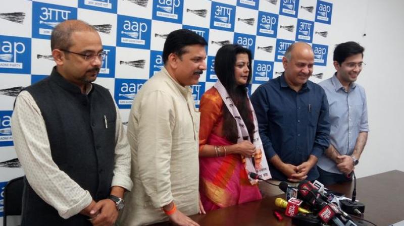 Suspended BJP MP Kirti Azads wife, Poonam Azad, joined the Aam Aadmi Party on Sunday. (Photo: AAP/Twitter)