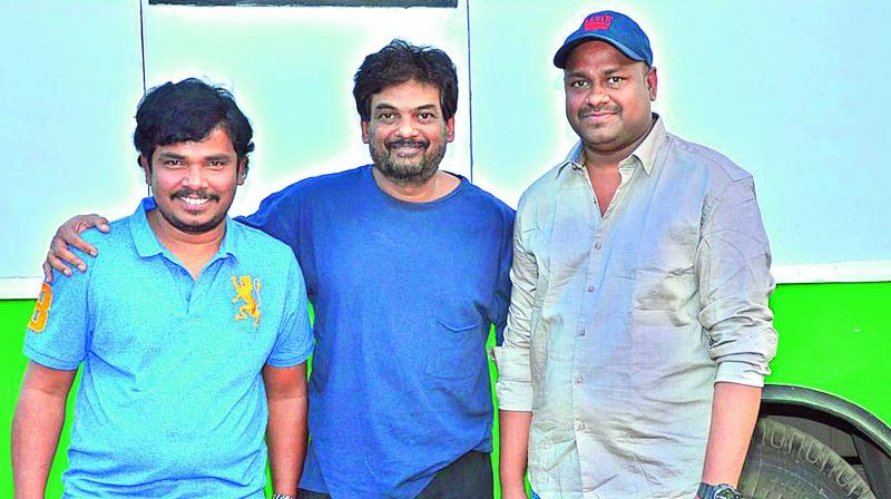 Sampoornesh Babu and Sai Rajesh, producer of Kobbari Matta, met Puri Jagannadh for the unveiling of a song trailer recently