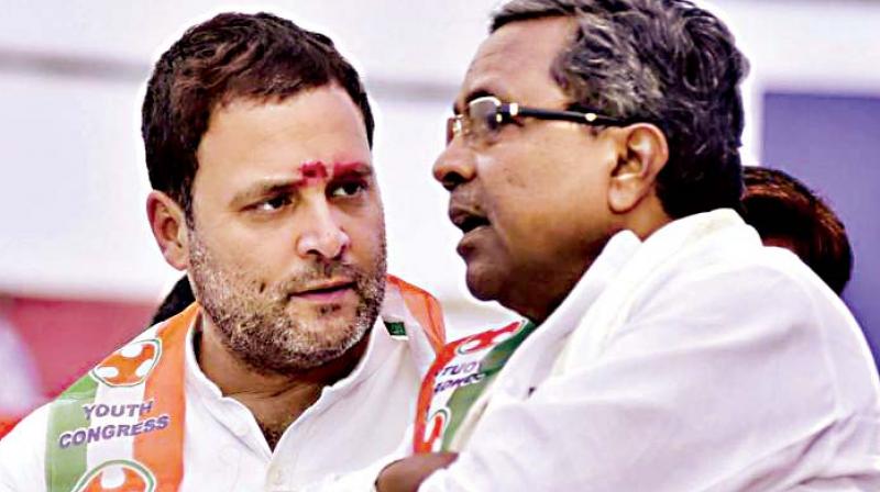 A file photo of former CM Siddaramaiah with Congress chief Rahul Gandhi.