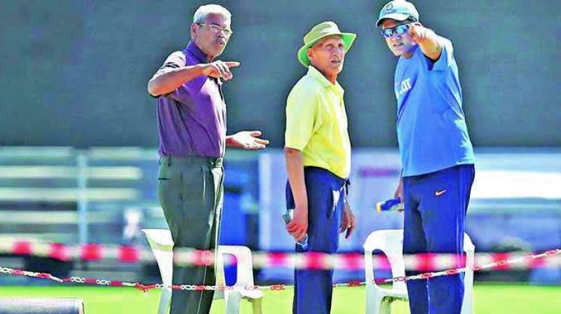 BCCI chief curator Daljit Singh (centre) and Pune curator Pandurang Salgaoncar (left) came under the scrutiny after rolling out a â€œpoorâ€pitch for the first Test against Australia.