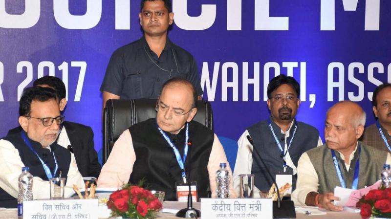 Union finance minister Arun Jaitley along with MoS for finance Shiv Pratap Shukla and finance secretary Hasmukh Adhia (left) at the 23rd GST Council Meeting, in Guwahati on Friday. (Photo: PTI)