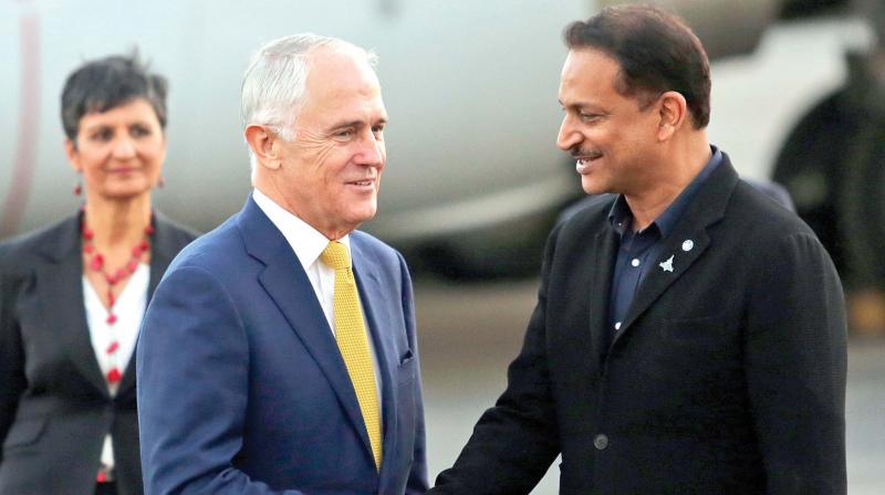 Australian PM Malcolm Turnbull is received by Union minister Rajiv Pratap Rudy, in New Delhi on Sunday. (Photo: AP)