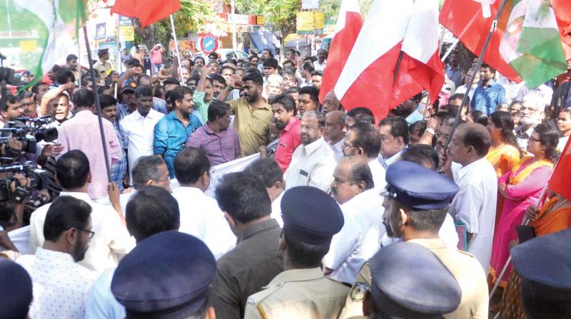 LDF activists take out a protest march to Kochi Corporation office against the callous approach of the civic administration in operating Brahmapuram waste treatment plant which resulted in massive fire. (Photo: SUNOJ NINAN MATHEW)