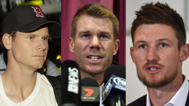 â€œI really wish, and hope, that Steve (Smith) and Cameron (Bancroft) have the same support that I have with me, because its going to be a tough and emotional time these next 12 months,\ said David Warner. (Photo: AP / AFP)