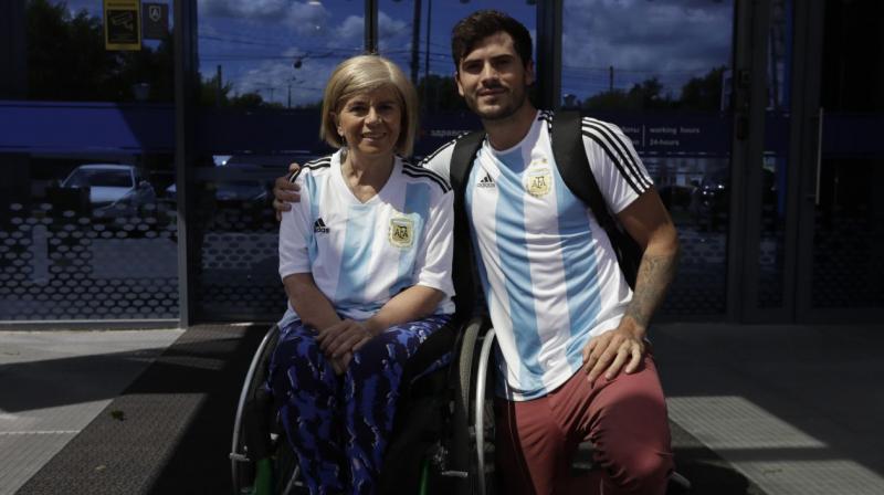 The Argentine fan of Lionel Messi, Nora Espector, who needs a wheelchair because she has multiple sclerosis, travelled to the World Cup in Russia with her youngest son. (Photo: AP)