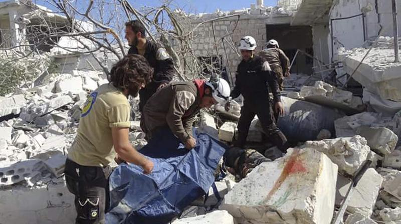 The toll increased after removing the debris in a long day of rescue operation, the Syrian Observatory for Human Rights said, adding the strikes hit residential buildings. (Photo: AFP)