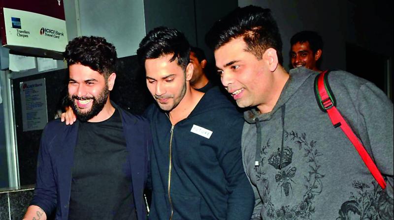 Karan Johar with varun Dhawan and Kunal Rawal