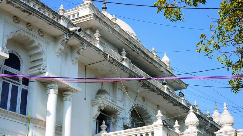 Wires crisscross the historic Legislature buildings.