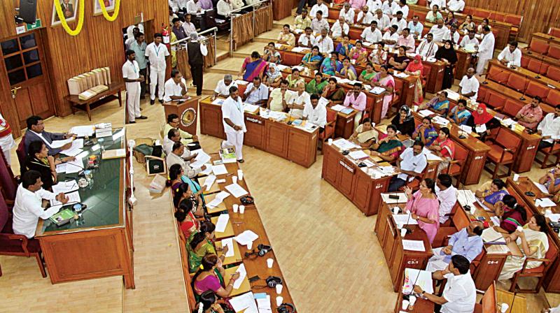 BBMP Opposition councilors debate during a council session.
